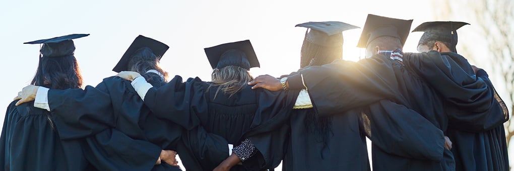Students celebrating at graduation.